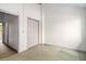 This spacious bedroom features a ceiling fan and a closet for ample storage at 718 Julian Cir, Lafayette, CO 80026