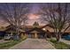 Charming townhome with an attached garage, mature trees and a spacious driveway at 718 Julian Cir, Lafayette, CO 80026