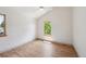 Well-lit bedroom featuring a vaulted ceiling, modern fan and large windows at 1321 W Caley Ave, Littleton, CO 80120