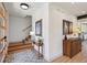 Open entryway with hardwood floors, staircase, decorative rug and modern decor at 1321 W Caley Ave, Littleton, CO 80120