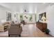 Bright living room with comfortable seating, stylish decor, and ample natural light at 1321 W Caley Ave, Littleton, CO 80120