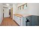 This mud room boasts custom cabinetry with butcher block countertops and built-in dog wash station at 1321 W Caley Ave, Littleton, CO 80120
