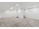 Finished basement with neutral carpeting and recessed lighting, offering ample space for recreation at 2033 E 21St Ave, Denver, CO 80205