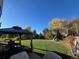 Large backyard with basketball court and trampoline at 7870 S Ogden Way, Centennial, CO 80122