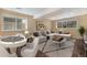Finished basement with a poker table, couch and television at 5210 Roadrunner Ave, Firestone, CO 80504