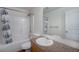 Bright bathroom with tub, shower, and a vanity at 5210 Roadrunner Ave, Firestone, CO 80504