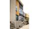 Modern townhouse featuring a combination of siding styles, sleek design, and a welcoming front entrance at 2858 W Parkside Pl, Denver, CO 80221
