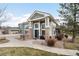 Attractive home with a welcoming entrance, manicured landscaping, and an inviting curb appeal at 13706 Legend Trail # 104, Broomfield, CO 80023