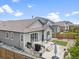 Charming backyard space with ample seating, ideal for enjoying sunny days at 18036 E 99Th Ave, Commerce City, CO 80022