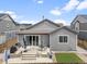 Relaxing backyard view, complete with a patio and well-maintained lawn at 18036 E 99Th Ave, Commerce City, CO 80022