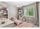 Charming bedroom with plush rug and whimsical decor at 18036 E 99Th Ave, Commerce City, CO 80022