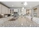 Granite countertops and light and bright cabinetry make this a wonderful spot to cook in! at 18036 E 99Th Ave, Commerce City, CO 80022