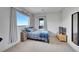Cozy bedroom featuring a twin bed, mountain views from the window and neutral decor at 31324 Kings Vly, Conifer, CO 80433