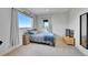 Comfortable bedroom featuring a twin bed, mountain views from the window and neutral decor at 31324 Kings Vly, Conifer, CO 80433
