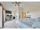 Bedroom with work space, featuring a comfortable bed and large ceilings at 31324 Kings Vly, Conifer, CO 80433