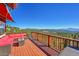 Relax on the large deck with comfortable outdoor seating and take in the breathtaking mountain views at 31324 Kings Vly, Conifer, CO 80433