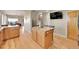 Spacious kitchen area with stainless steel appliances and center island for additional prep space at 31324 Kings Vly, Conifer, CO 80433