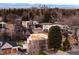 Stunning aerial view of home in an urban neighborhood with a skyline in the background at 1 S Forest St, Denver, CO 80246