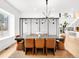 Spacious dining room featuring a modern light fixture, a large table, and stylish chairs at 1 S Forest St, Denver, CO 80246