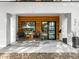 Inviting covered front porch with chairs at 1 S Forest St, Denver, CO 80246