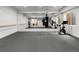 Spacious home gym equipped with a large mirror, punching bags, and various exercise equipment at 1 S Forest St, Denver, CO 80246