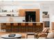 Modern kitchen featuring stainless steel appliances, sleek cabinetry, and a spacious breakfast bar at 1 S Forest St, Denver, CO 80246