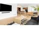 Inviting living room with hardwood floors, a modern sofa, and an open-concept design at 1 S Forest St, Denver, CO 80246