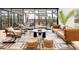 Cozy living room with comfortable seating, stylish rug, and view of the outdoor patio at 1 S Forest St, Denver, CO 80246