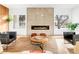 Contemporary living room featuring a modern fireplace, stylish furnishings, and natural light at 1 S Forest St, Denver, CO 80246