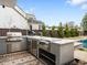 Built in outdoor kitchen with a grill and stainless steel appliances at 1 S Forest St, Denver, CO 80246