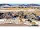 Beautiful home with mountain views, surrounded by well-maintained landscaping and a private backyard at 9335 Dunraven Loop, Arvada, CO 80007