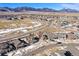 A mountain view community showcases the beauty of the home and its surroundings at 9335 Dunraven Loop, Arvada, CO 80007