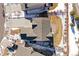 A bird's eye view shows a backyard in the middle of winter in this neighborhood home at 9335 Dunraven Loop, Arvada, CO 80007