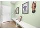 Inviting foyer with tile flooring, a bench, and decorative wall art at 9335 Dunraven Loop, Arvada, CO 80007