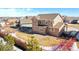 Charming two-story home boasting a well-manicured backyard with privacy fencing at 9335 Dunraven Loop, Arvada, CO 80007