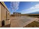 Home with a backyard featuring a pergola-covered patio, an air conditioning unit, and an expansive view at 11595 Pass Me By Rd, Strasburg, CO 80136