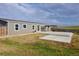 Home featuring a patio and pergola in the backyard with views of a grassy field at 11595 Pass Me By Rd, Strasburg, CO 80136
