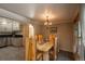 Dining room with a rustic table and chairs at 28268 Shadow Mountain Dr, Conifer, CO 80433