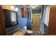 Bathroom vanity and shower with patterned tile flooring at 2840 Wagner St, Strasburg, CO 80136