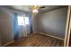Bedroom with ceiling fan, window and closet at 2840 Wagner St, Strasburg, CO 80136