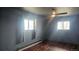 Bedroom with wood floors, ceiling fan and natural light at 2840 Wagner St, Strasburg, CO 80136