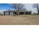 Charming brick home with an attached two car garage and spacious front yard at 2840 Wagner St, Strasburg, CO 80136