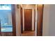 Hallway leading to a bathroom with modern fixtures and a vanity sink at 2840 Wagner St, Strasburg, CO 80136