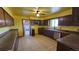 Functional kitchen with stainless steel appliances and ample cabinet storage at 2840 Wagner St, Strasburg, CO 80136