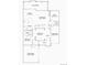 Detailed floor plan showcasing the layout of the first floor with kitchen, dining, and garage at 635 Twilight St, Erie, CO 80516