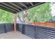 A partially covered deck provides plenty of space for enjoying the outdoors and shaded area at 3429 Avenue D, Kittredge, CO 80457