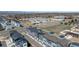 Stunning aerial view of modern townhomes featuring stylish architecture and convenient street access at 1525 W 68Th Ave, Denver, CO 80221