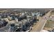 Scenic aerial shot showcasing a neighborhood with contemporary townhouses in a well-planned community at 1525 W 68Th Ave, Denver, CO 80221