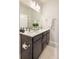 Nicely appointed bathroom featuring a double vanity with modern fixtures and lots of storage space at 1525 W 68Th Ave, Denver, CO 80221
