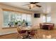 Dining area features large windows and an eat in breakfast nook with overhead lighting at 20995 County Road 28, Hudson, CO 80642